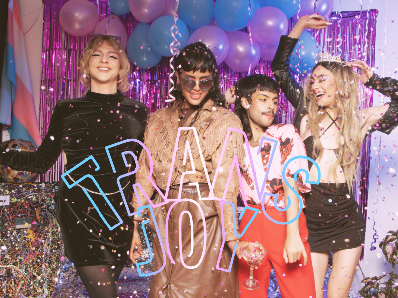 four trans and genderqueer people celebrate joyfully surrounding by trans pride balloons, confetti, and party decor